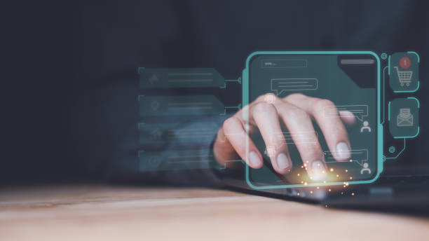 istock Human hand using a laptop computer,Conversation in the chat box icon,social media creation ideas,Chatting and commenting with social networks ,response and chat customer service,online communication 1480222557