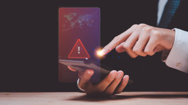 istock Programmer and virtual icons , exclamation mark ,alarm,computer virus detected ,danger warning concept or information error that should be urgently fixed and repaired ,Notification of security issues 1480222567