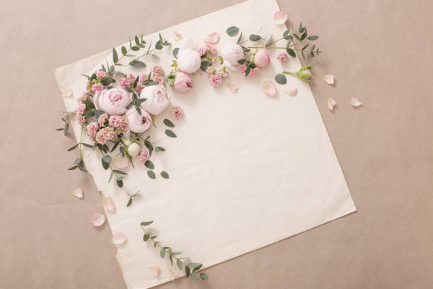 istock beautiful roses on background  old paper 1480227724