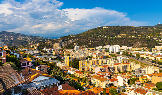 Nice, France - August 7, 2022: Mount Gros and Alpes hills with Astronomical Observatory over Paillon river valley seen from Cimiez district of Nice on French Riviera Azure Coast