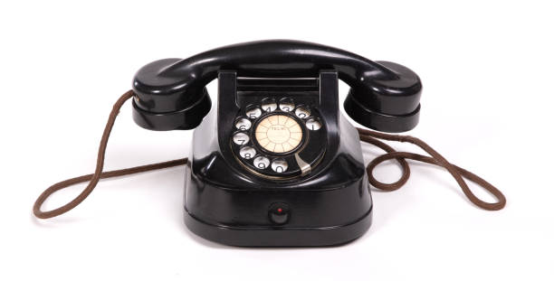 istock Old black telephone set on a white background 1480229696