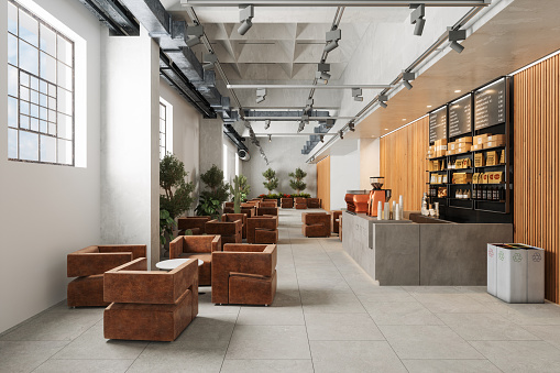 Empty Coffee Shop Interior With Tables, Armchairs, Coffee Maker And Potted Plants