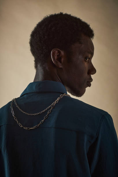 istock Profile view portrait of young black man 1480238742