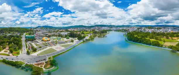 Photo of Top view of Lam Vien square at the bank of Xuan Huong Lake. In Vietnam, Da Lat is a popular destination attracting thousands of tourists. Urban development texture, green parks and city lake.