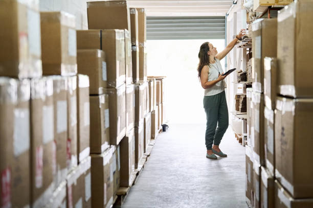 istock Woman supervisor checking packages in ceramic factory warehouse 1480241269