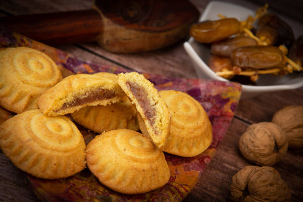 istock Traditional eid maamoul or mamoul cookies with dates, nuts, and jam, Arabic sweets for Aid al-Fitr and easter 1480242481
