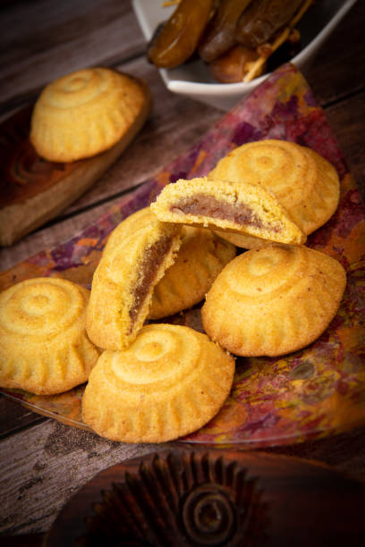 istock Traditional eid maamoul or mamoul cookies with dates, nuts, and jam, Arabic sweets for Aid al-Fitr and easter 1480242657