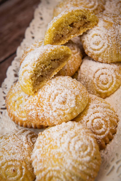 istock Traditional eid maamoul or mamoul cookies with dates, nuts, and jam, Arabic sweets for Aid al-Fitr and easter 1480243038