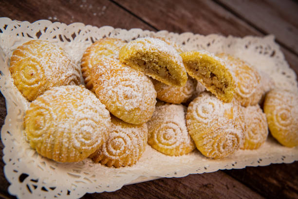 istock Traditional eid maamoul or mamoul cookies with dates, nuts, and jam, Arabic sweets for Aid al-Fitr and easter 1480243064