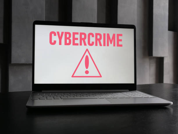 istock Cybercrime is shown using the text on the screen of laptop 1480243883