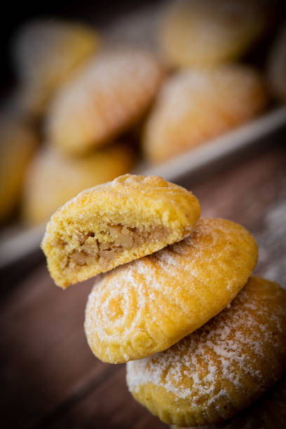 Traditional eid maamoul or mamoul cookies with dates, nuts, and jam, Arabic sweets for Aid al-Fitr and easter, High quality photo