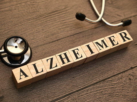 Alzheimer, text words typography written with wooden letter, health and medical concept