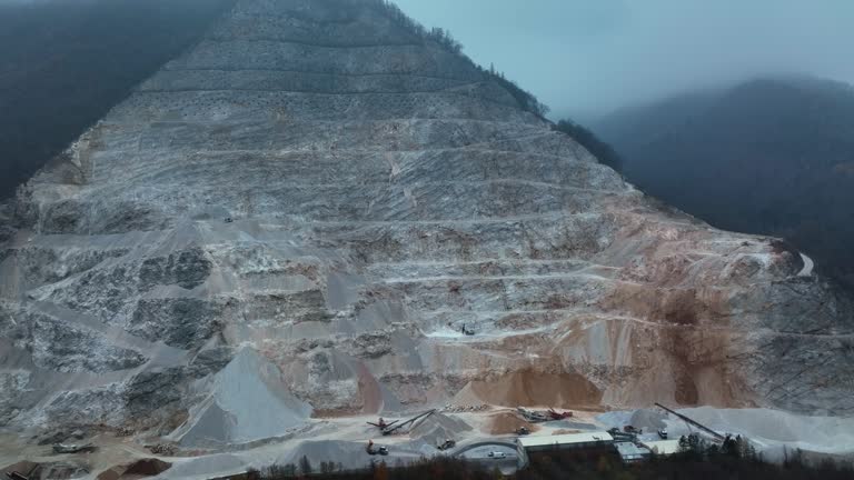 Majestic Quarry In Slovenia Surrounded By Fog