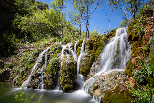 Beautiful waterfall of the Zumeta river in Santiago de la Espada, in the natural park of Sierra de Cazorla, Jaen, Spain