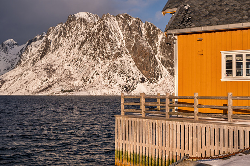 View on Husøy, Senja fishing village  in the Øyfjorden in Troms County in  Northern Norways during winter.