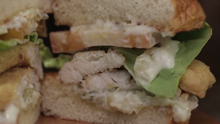 Fish Fillet Burger Sliced Close up - Display - Slider - Left To Right
