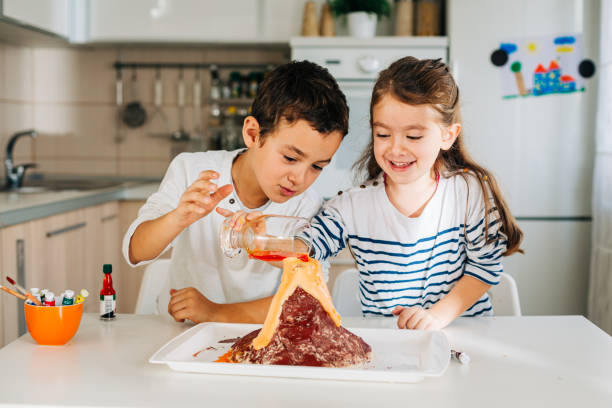 Children Making Experiment At Home