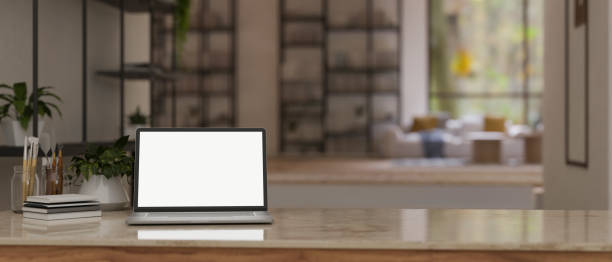 istock Workspace close-up with laptop mockup and copy space on a tabletop 1480261605