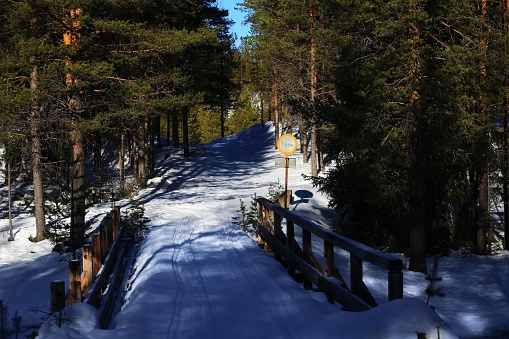 Small frozen wood bridge in northern Sweden, with weight restriction (1,5 ton).