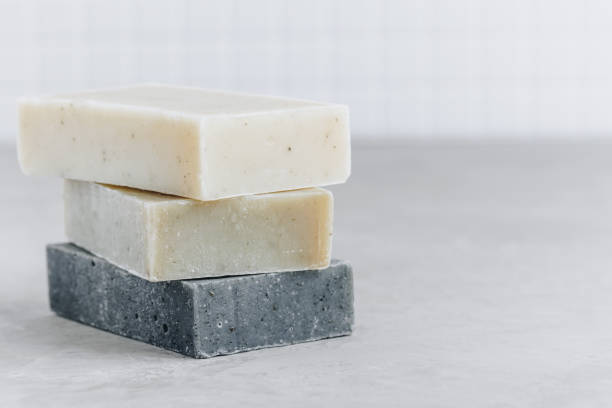 istock Soap. Organic soap bars. Stack of natural soap bars on gray stone background 1480267168