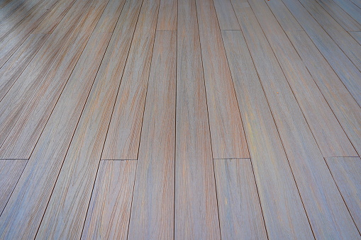 Artificial wooden floor with stripes background