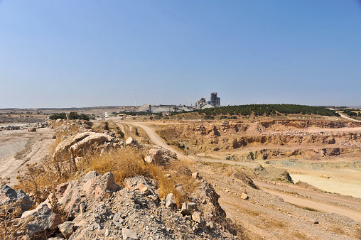 Dirt and gravel road  and factory