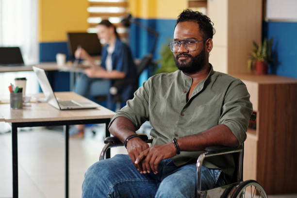 istock Indian Businessman in Wheelchair 1480270983
