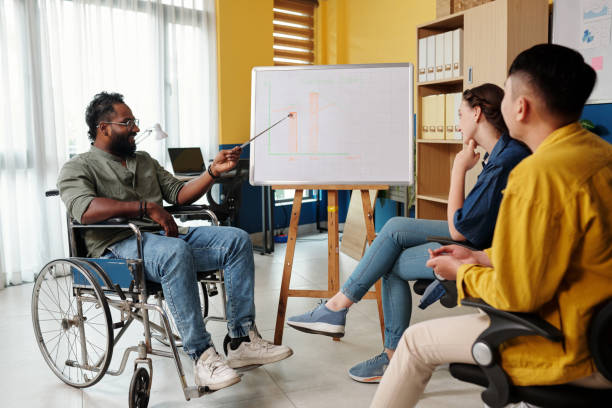 istock Entrepreneur Speaking in front of Colleagues 1480271037