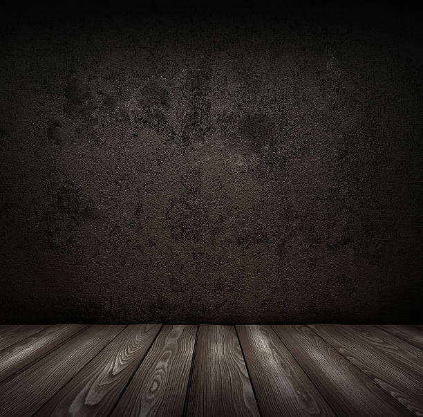 istock wooden floor and black wall 148027192