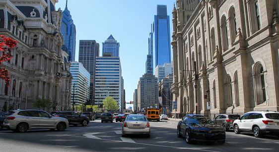Philadelphia, Pennsylvania, USA - 29 April 2022: Cars moving around the court buildings in center City Philadelphia.