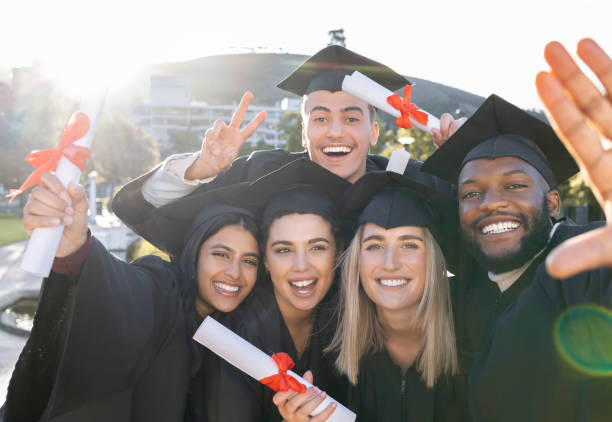 istock University student group, selfie and holding diploma with pride, success and happiness with support for diversity. Friends, students and graduate celebration photo for education, learning and future 1480277404