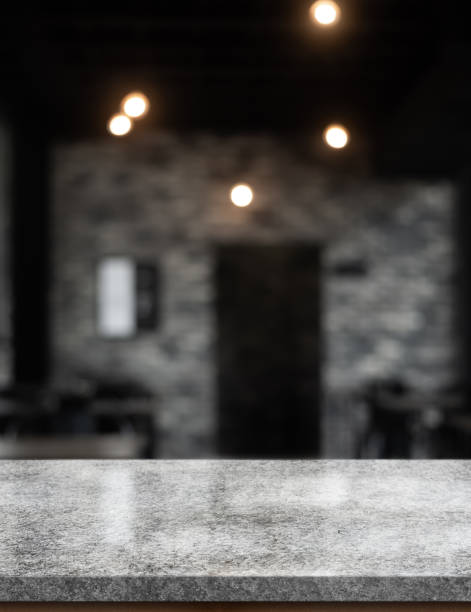istock Empty white marble stone table top and blur interior cafe and restaurant. 1480281549