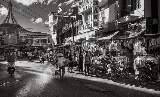 A general view of a bustling street outside the central market in Pleiku, Vietnam.