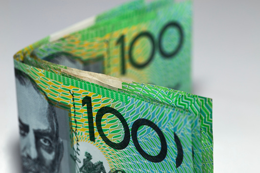 100 Australian dollars on white background
