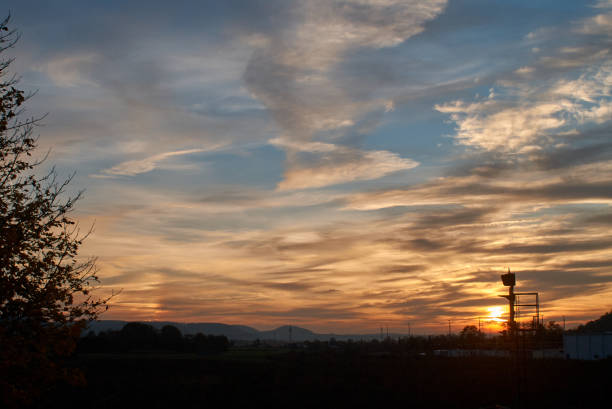 istock Sunset over the field with a water tower in the foreground. 1480288592