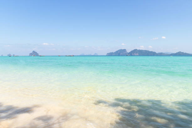 Paradise beach is a really tranquil place. Crystal clear water and a very interesting snorkeling reef at Koh Kradan in Trang, Thailand. stock photo