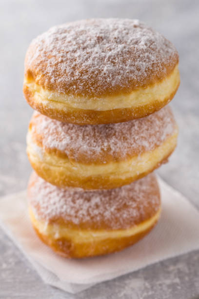 istock Three donuts stand on top of each other 1480300674