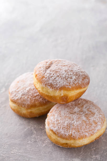 istock donuts with filling sprinkled with powdered sugar 1480300692