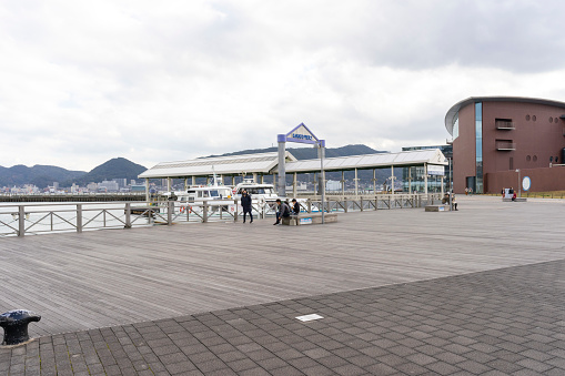 Shimonoseki, Japan - Dec 29,2022 : Seaside promenade at the Aruka Port in Shimonoseki, Japan on Dec 29,2022.