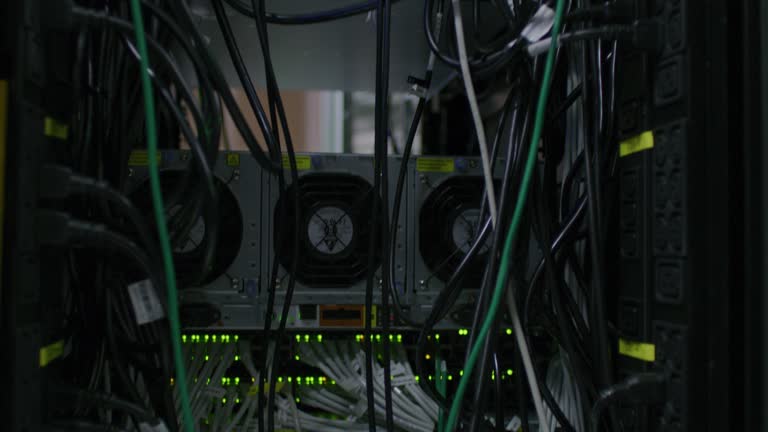 Data center, background and cables of hardware network, power connection and computer engineering. Closeup in server room, computing and wires for cybersecurity, internet storage and router system