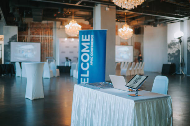 istock reception desk seminar business conference hall with registration table and QR Code on digital table self check in counter 1480315781