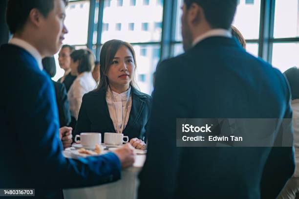 Asian Multiethnic Business People Talk During A Coffee Break In Seminar Business Conference Stock Photo - Download Image Now
