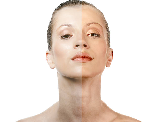 istock Girl showing differences of face tan 148032010