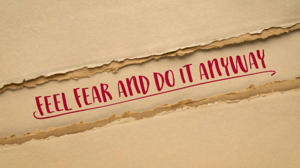 Feel fear and do it anyway - inspiration handwriting, challenge, courage and personal development concept Feel fear and do it anyway - inspiration handwriting, challenge, courage and personal development concept anyway stock pictures, royalty-free photos & images