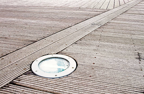 Floor light on wood decking background stock photo