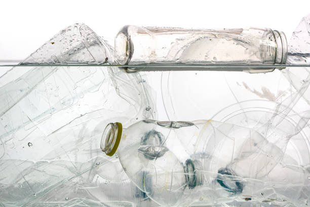 istock Plastic waste in the water - concept of plastic pollution 1480334226