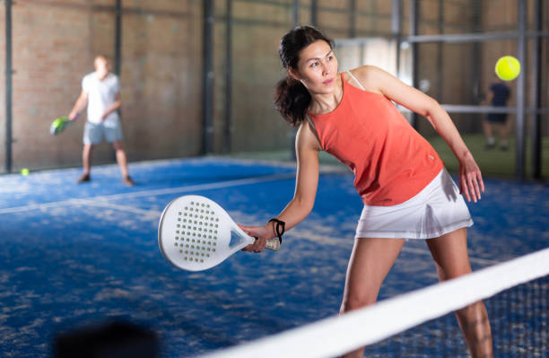 istock Beautiful asian woman playing padel 1480334341