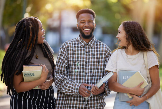 istock Friends, university students and group portrait at park outdoors ready to start learning business management. Scholarship books, comic and happy people, black man and women laughing at college meme. 1480342742