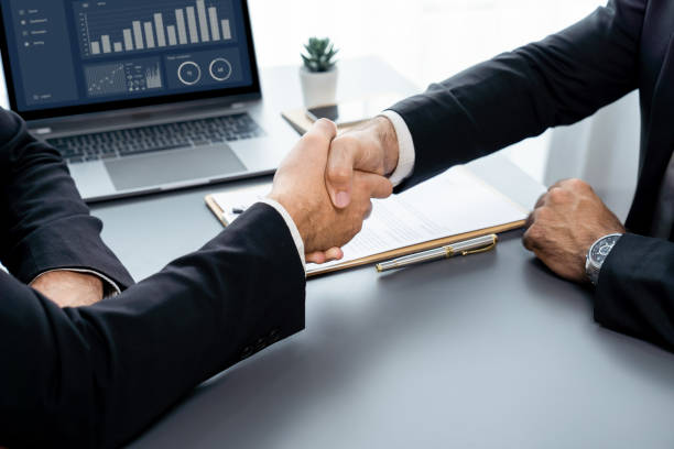 istock Successful job interview at business office with handshake. Fervent 1480344007