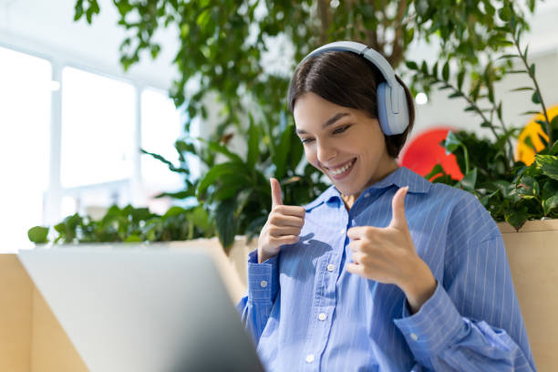 istock Contented young female approving something during the video call 1480345016